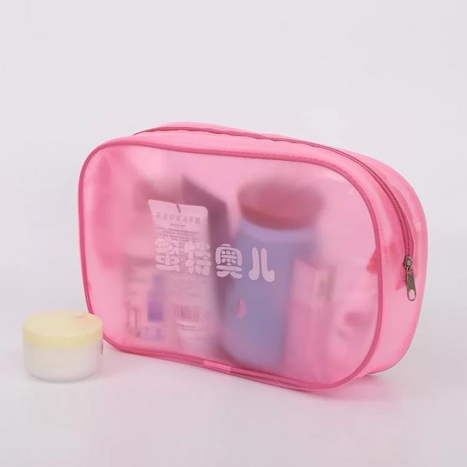La bolsa de plástico rosada del PVC del maquillaje con la cinta mágica y la superficie de costura del arte de la secuencia