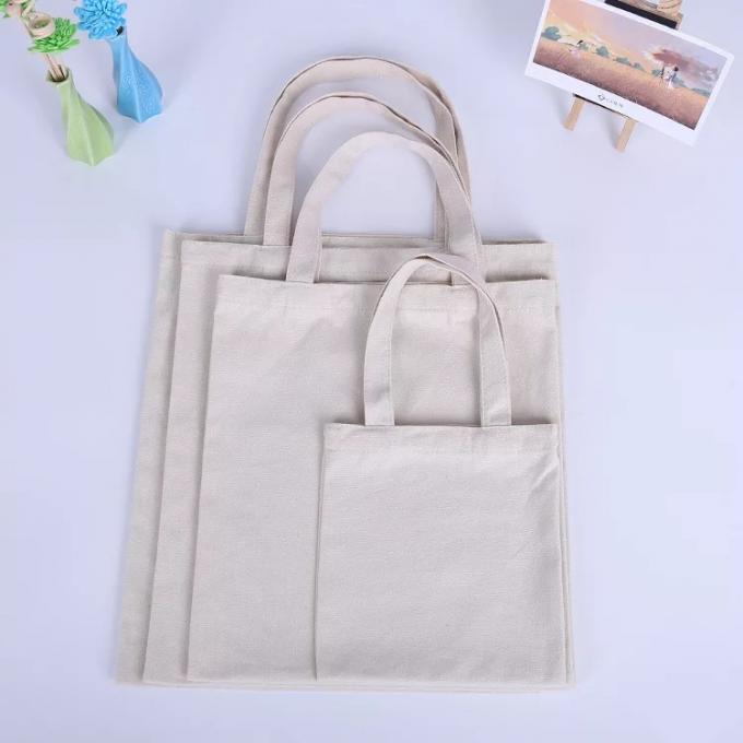 Desgaste - bolsos promocionales del regalo del algodón resistente con la impresión a todo color laminada